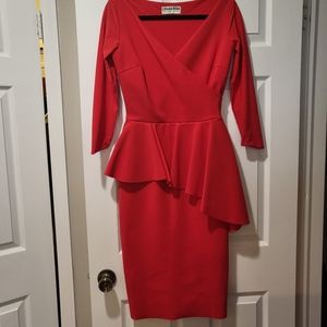 Chiara Boni red dress with the side ruffle.